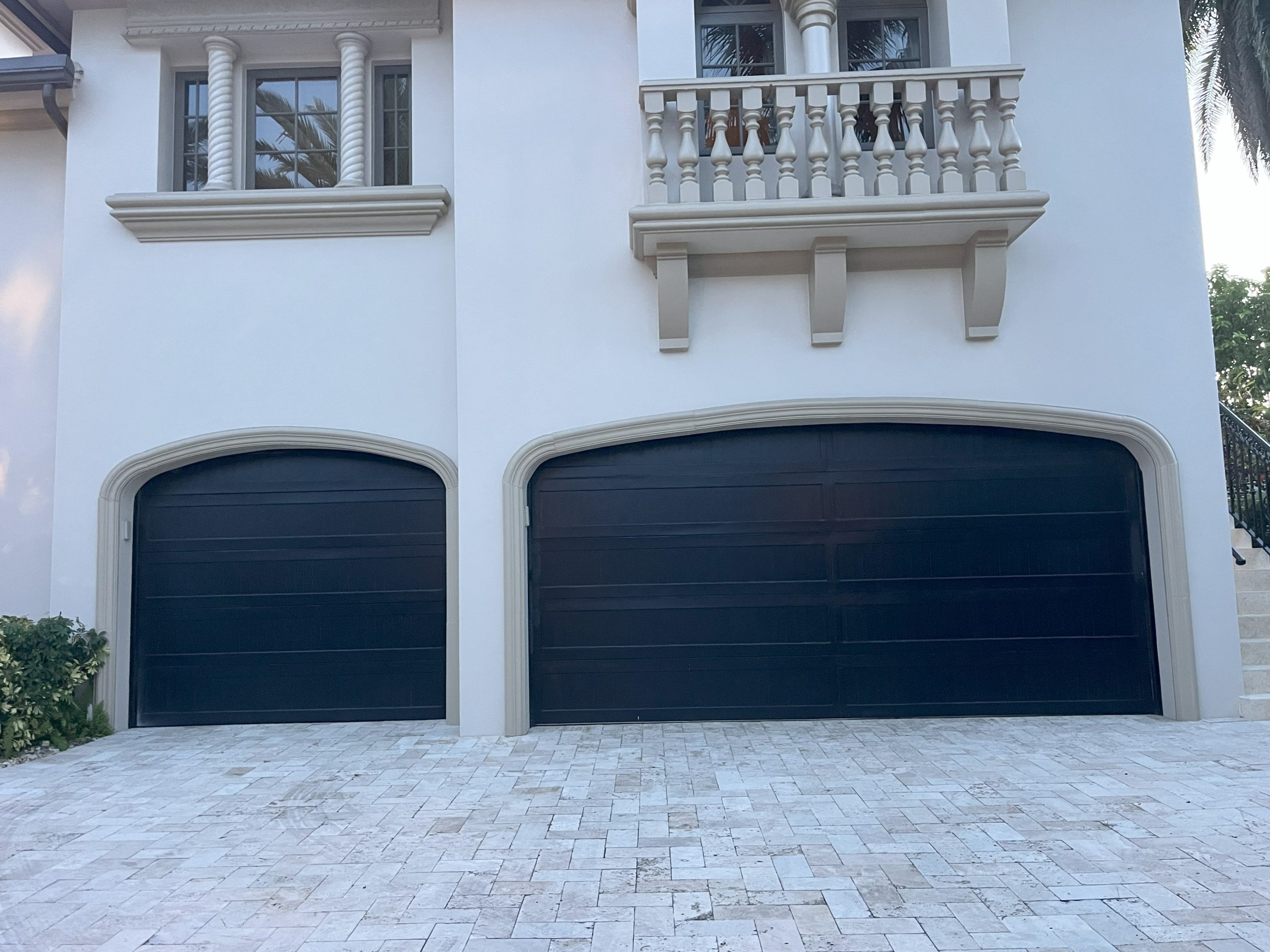 Modern black garage doors — Hollywood, FL