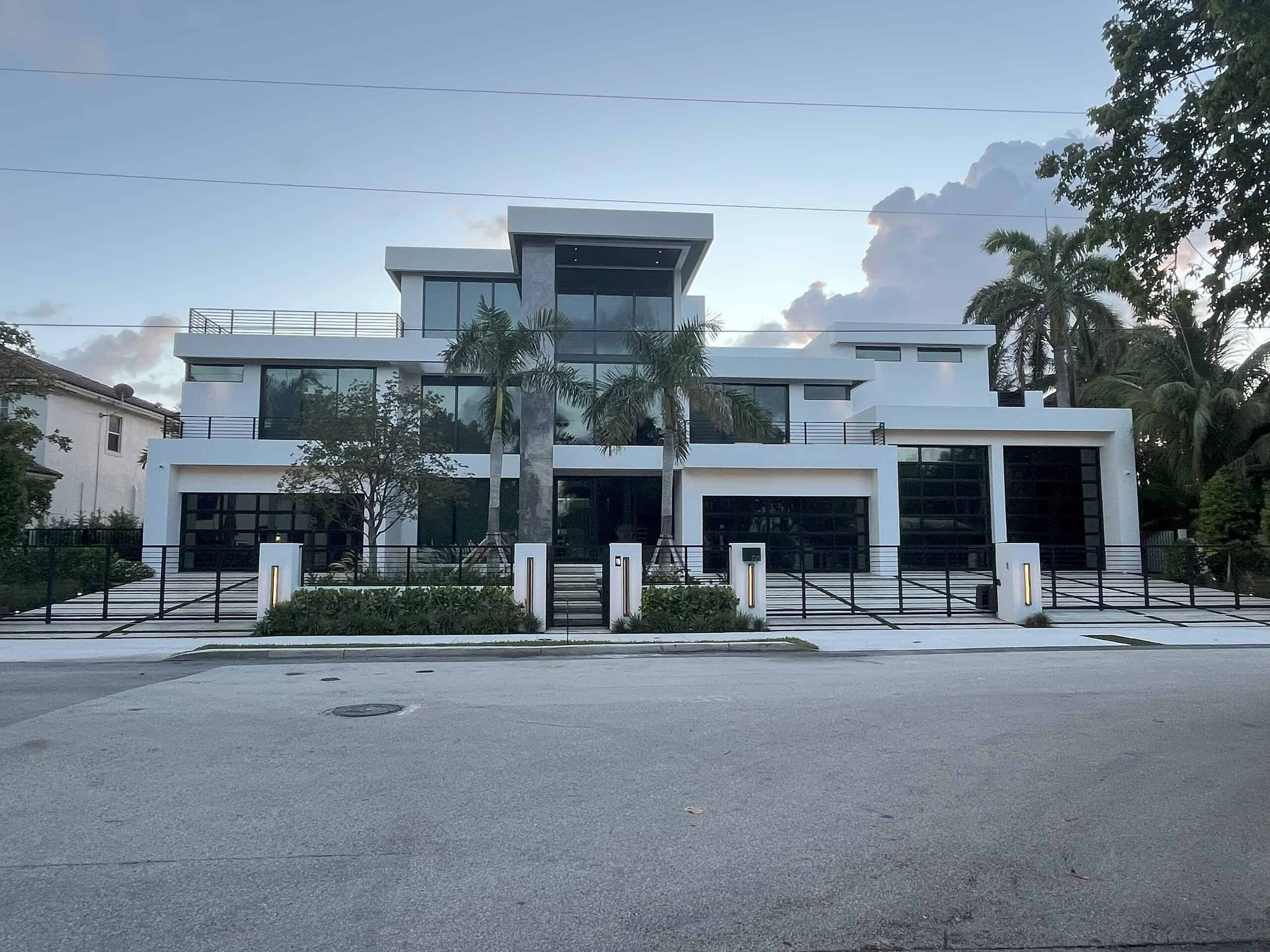 Modern glass garage door installation on Marco Island