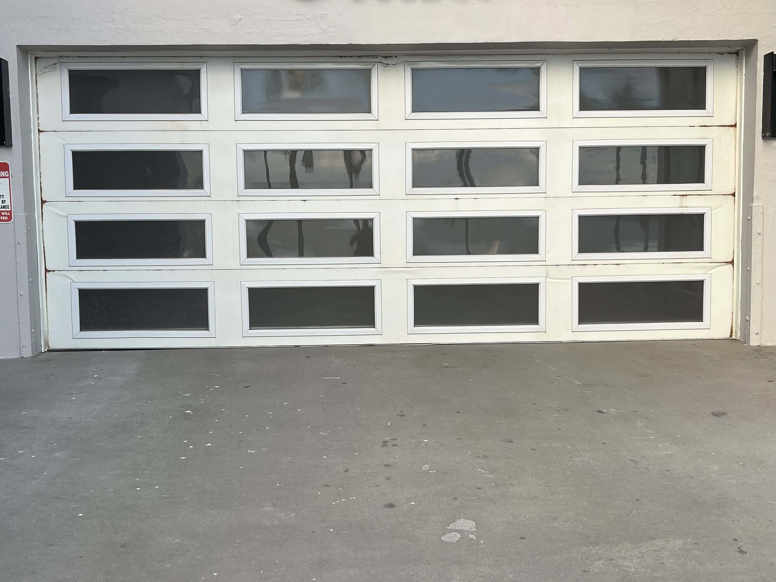 White sectional garage door repair — Parrish, FL
